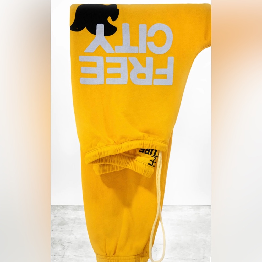 Hardly worn yellow free city sweatpants